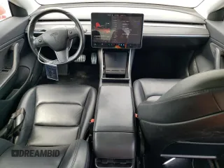 2018 Tesla Model 3 Long Range Battery with VIN 5YJ3E1EAXJF031944, listed as a Copart auction lot 53619445 with 146,031 mi miles and Salvage Title. Bid and sale history available at DreamBid. Image 8.