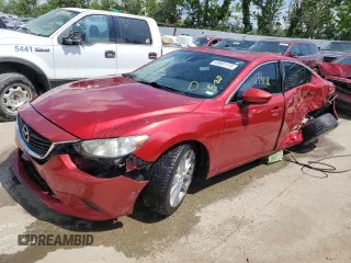 2014 Mazda 6 i Touring with VIN JM1GJ1T6XE1118477, listed as a Copart auction lot 55851174 with 139,126 mi miles and Salvage Title. Bid and sale history available at DreamBid. Image 1.