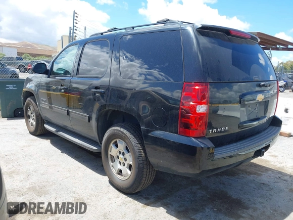 2013 Chevrolet Tahoe LS with VIN 1GNSCAE04DR104790, listed as a IAAI auction lot 42225652 with 119,948 mi miles and . Bid and sale history available at DreamBid. Image 3.