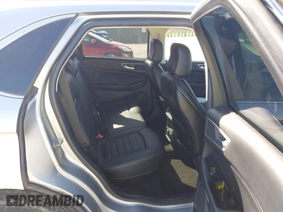 2020 Ford Edge SEL z VIN 2FMPK4J93LBB01318, wystawiony jako IAAI lot #42038334 z przebiegiem 73 435 mil mil oraz . Historia ofert i sprzedaży dostępna na DreamBid. Obrazek 8.