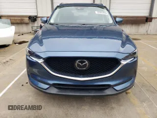 2018 Mazda CX-5 Grand Touring with VIN JM3KFADM8J1351624, listed as a Copart auction lot 50965465 with 66,210 mi miles and Salvage Title. Bid and sale history available at DreamBid. Image 5.