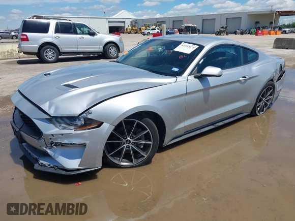 2018 Ford Mustang EcoBoost with VIN 1FA6P8THXJ5128830, listed as a IAAI auction lot 42192673 with 58,817 mi miles and . Bid and sale history available at DreamBid. Image 18.