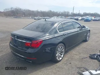 2015 BMW 7 Series 740Li xDrive with VIN WBAYF4C55FD874116, listed as a IAAI auction lot 41877144 with 156,280 mi miles. Bid and sale history available at carsss.com. Image 4.