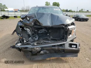 2018 Ford F-150 XL z VIN 1FTFX1EG9JFE34899, wystawiony jako Copart lot #60716205 z przebiegiem 71 187 mil mil oraz Szkoda całkowita • Salvage title. Historia ofert i sprzedaży dostępna na DreamBid. Obrazek 5.