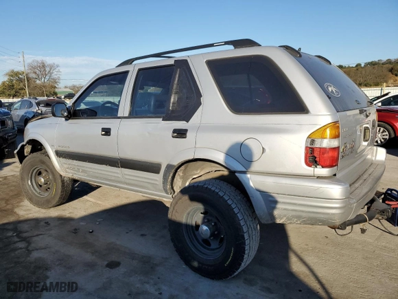 1998 Isuzu Rodeo S with VIN 4S2CM58W7W4323393, listed as a Copart auction lot 77571224 with 261,881 mi miles and Clean Title. Bid and sale history available at carsss.com. Image 2.