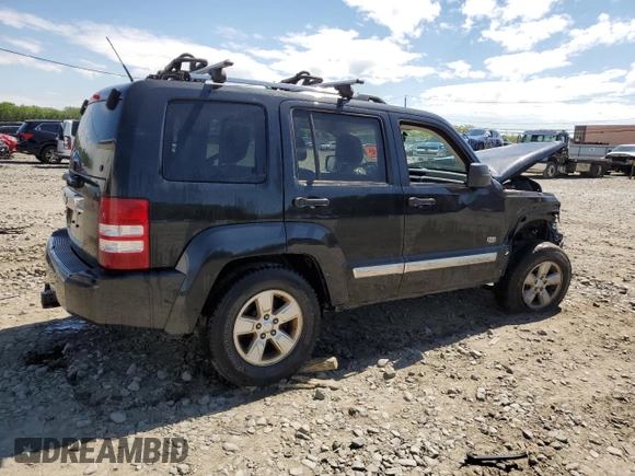 2011 Jeep Liberty Sport Jet z VIN 1J4PN2GK4BW558575, wystawiony jako Copart lot #55954565 z przebiegiem Nie podano mil oraz Szkoda całkowita • Salvage title. Historia ofert i sprzedaży dostępna na DreamBid. Obrazek 3.