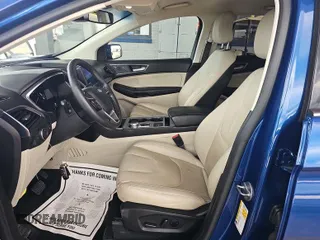 2021 Ford Edge Titanium with VIN 2FMPK3K98MBA53776, listed as a IAAI auction lot 42785493 with 114,856 mi miles and . Bid and sale history available at DreamBid. Image 15.