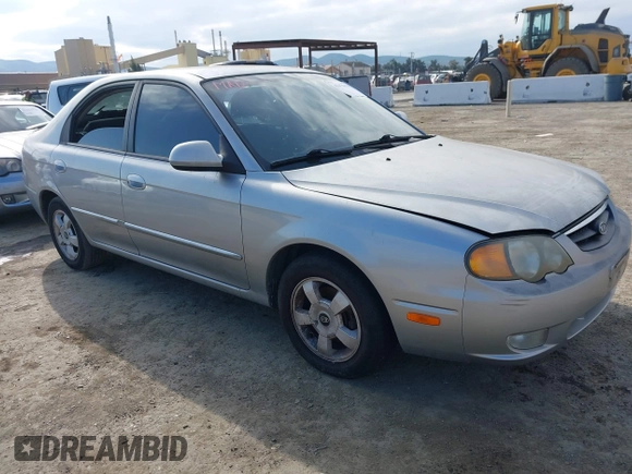 2003 Kia Spectra GS z VIN KNAFB161535095413, wystawiony jako IAAI lot #41478418 z przebiegiem 141 441 mil mil oraz . Historia ofert i sprzedaży dostępna na DreamBid. Obrazek 1.