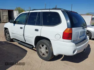2002 GMC Envoy SLT с VIN 1GKDT13SX22290996, выставлен на аукционе IAAI как лот 42398689 с пробегом 146 987 миль миль и . История ставок и продаж доступна на DreamBid. Изображение 3.