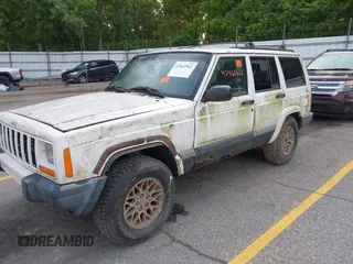 1999 Jeep Cherokee Sport z VIN 1J4FF68S0XL663735, wystawiony jako IAAI lot #42463562 z przebiegiem Nie podano mil oraz . Historia ofert i sprzedaży dostępna na DreamBid. Obrazek 2.