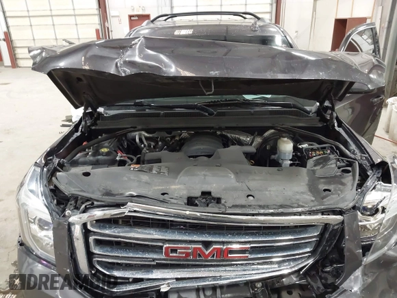 2016 GMC Yukon SLT z VIN 1GKS2BKC2GR320923, wystawiony jako IAAI lot #42196868 z przebiegiem 134 754 mil mil oraz . Historia ofert i sprzedaży dostępna na DreamBid. Obrazek 10.