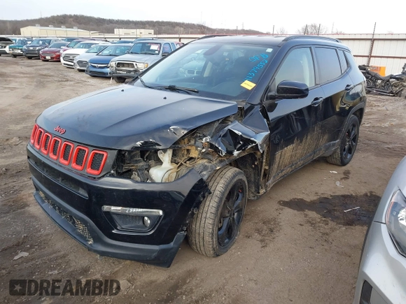 2020 Jeep Compass Latitude with VIN 3C4NJDBB9LT137387, listed as a IAAI auction lot 41379552 with 79,083 mi miles and . Bid and sale history available at carsss.com. Image 2.