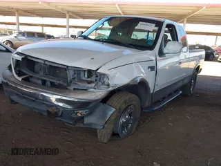 2003 Ford F-150 XL with VIN 1FTRX18L03NA45728, listed as a IAAI auction lot 41860421 with 179,596 mi miles. Bid and sale history available at carsss.com. Image 17.