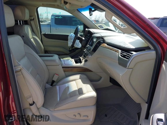 2020 GMC Yukon XL Denali with VIN 1GKS1HKJ3LR238701, listed as a IAAI auction lot 41724274 with 107,323 mi miles and . Bid and sale history available at DreamBid. Image 5.