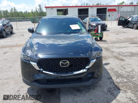 2023 Mazda CX-5 2.5 S Premium Plus Package with VIN JM3KFBEM5P0256652, listed as a IAAI auction lot 41936376 with 31,332 mi miles. Bid and sale history available at carsss.com. Image 12.