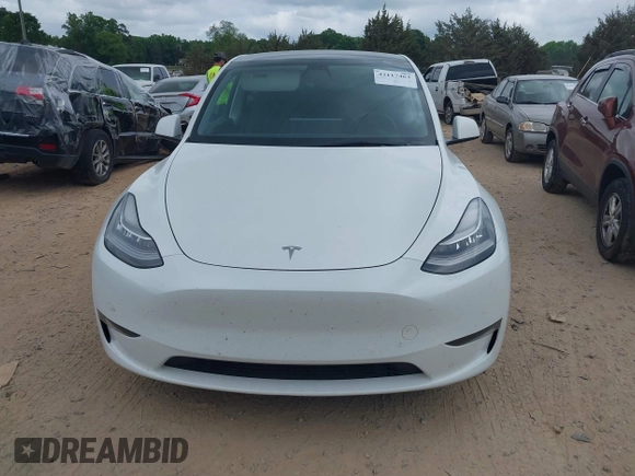 2021 Tesla Model Y Long Range with VIN 5YJYGDEE7MF198867, listed as a IAAI auction lot 42117463 with 79,759 mi miles and . Bid and sale history available at DreamBid. Image 12.