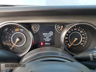 2023 Jeep Wrangler Sport with VIN 1C4HJXDNXPW701795, listed as a Copart auction lot 50451444 with 7,274 mi miles and Salvage Title. Bid and sale history available at DreamBid. Image 9.