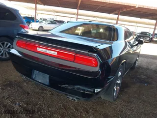 2013 Dodge Challenger SXT with VIN 2C3CDYAG1DH629087, listed as a IAAI auction lot 41993728 with 226,948 mi miles. Bid and sale history available at carsss.com. Image 17.