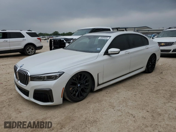 2021 BMW 7 Series 740i with VIN WBA7T2C06MCF88813, listed as a Copart auction lot 49589555 with 60,802 mi miles and Salvage title. Bid and sale history available at DreamBid. Image 1.