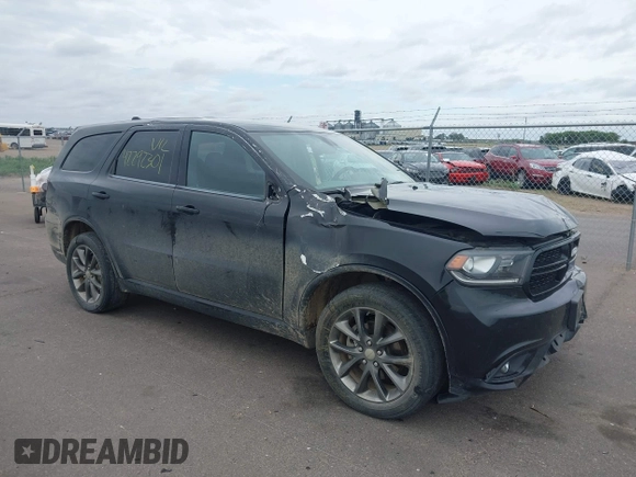 2014 Dodge Durango SXT with VIN 1C4RDJAG1EC552075, listed as a IAAI auction lot 42292301 with 122,427 mi miles and . Bid and sale history available at DreamBid. Image 1.
