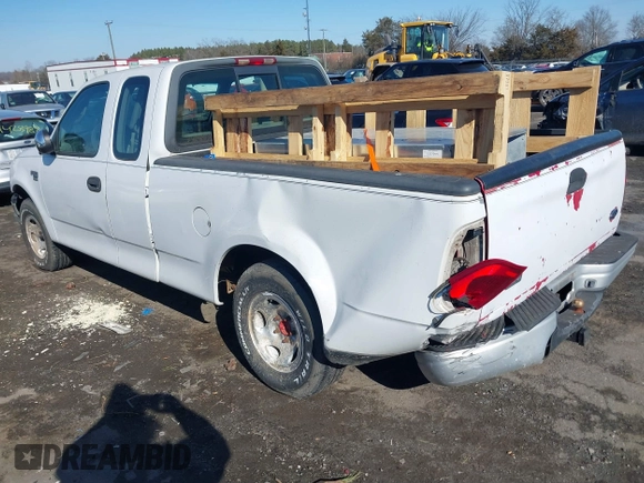 2000 Ford F-150 z VIN 2FTPX17L7YCA51774, wystawiony jako IAAI lot #41426958 z przebiegiem 421 412 mil mil oraz . Historia ofert i sprzedaży dostępna na DreamBid. Obrazek 3.