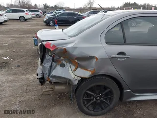 2017 Mitsubishi Lancer ES with VIN JA32U2FU6HU010683, listed as a IAAI auction lot 41866645 with 83,439 mi miles. Bid and sale history available at carsss.com. Image 21.