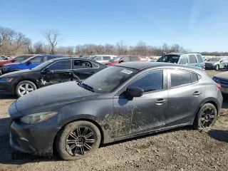 2014 Mazda 3 i Sport with VIN JM1BM1K7XE1186810, listed as a Copart auction lot 42239495 with 136,947 mi miles and Salvage Title. Bid and sale history available at carsss.com. Image 1.