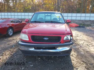 1997 Ford F-150 z VIN 1FTDF176XVNA86993, wystawiony jako IAAI lot #40938916 z przebiegiem 259 755 mil mil oraz . Historia ofert i sprzedaży dostępna na DreamBid. Obrazek 12.