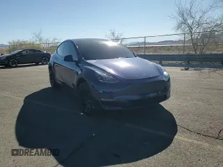 2023 Tesla Model Y Long Range z VIN 7SAYGDEE2PF908622, wystawiony jako Copart lot #47228145 z przebiegiem 10 639 mil mil oraz Szkoda całkowita • Salvage title. Historia ofert i sprzedaży dostępna na DreamBid. Obrazek 11.
