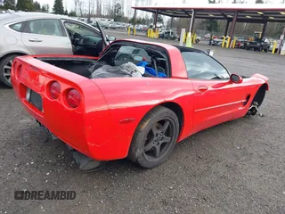 2004 Chevrolet Corvette with VIN 1G1YY22G545121321, listed as a IAAI auction lot 41601136 with 1 mi miles. Bid and sale history available at carsss.com. Image 4.