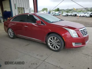 2014 Cadillac XTS Luxury with VIN 2G61M5S3XE9154762, listed as a Copart auction lot 64671105 with 145,394 mi miles and Clean title. Bid and sale history available at DreamBid. Image 4.