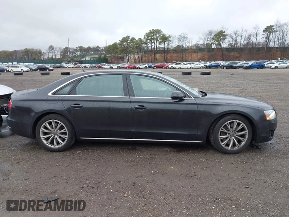 2012 Audi A8 L with VIN WAURVAFD7CN011767, listed as a IAAI auction lot 41848096 with 98,397 mi miles. Bid and sale history available at carsss.com. Image 13.
