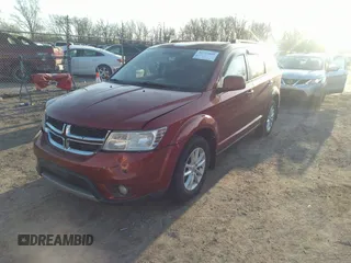 2013 Dodge Journey SXT with VIN 3C4PDCBG4DT659738, listed as a IAAI auction lot 41777689 with 165,050 mi miles. Bid and sale history available at carsss.com. Image 2.