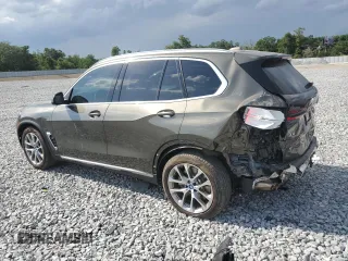2024 BMW X5 xDrive50e z VIN 5UX43EU07R9S85366, wystawiony jako Copart lot #54894225 z przebiegiem 21 712 mil mil oraz Szkody całkowita. Historia ofert i sprzedaży dostępna na DreamBid. Obrazek 2.