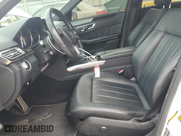 2014 Mercedes-Benz E 350 Luxury with VIN WDDHF8JB9EB042846, listed as a Copart auction lot 59943385 with 124,002 mi miles and Salvage title. Bid and sale history available at DreamBid. Image 7.