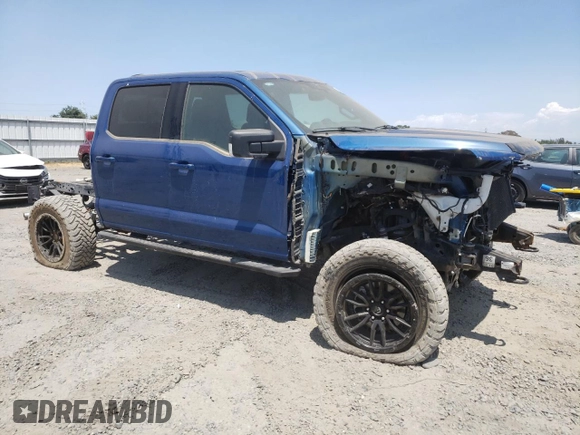 2023 Ford F-150 XL with VIN 1FTFW1E8XPKE23518, listed as a Copart auction lot 60340975 with 11,661 mi miles and Salvage title. Bid and sale history available at DreamBid. Image 4.