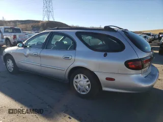 1999 Ford Taurus SE with VIN 1FAFP58U5XG240517, listed as a Copart auction lot 83514044 with 101,092 mi miles and Clean title. Bid and sale history available at DreamBid. Image 2.