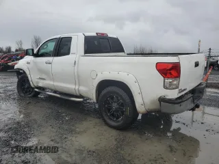 2011 Toyota Tundra 4WD Truck LTD with VIN 5TFBY5F12BX163659, listed as a Copart auction lot 87065074 with 262,150 mi miles and Salvage Title. Bid and sale history available at carsss.com. Image 2.