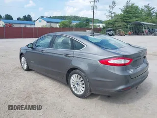2014 Ford Fusion SE Hybrid with VIN 3FA6P0LU3ER152517, listed as a IAAI auction lot 42801042 with 209,898 mi miles and . Bid and sale history available at DreamBid. Image 3.