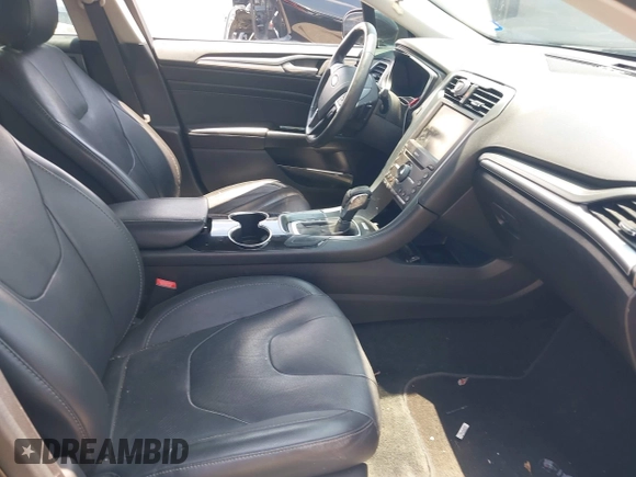 2016 Ford Fusion Titanium with VIN 3FA6P0K93GR113507, listed as a IAAI auction lot 42458659 with 133,708 mi miles and . Bid and sale history available at DreamBid. Image 5.