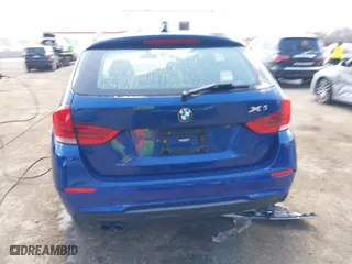 2015 BMW X1 sDrive28i with VIN WBAVM1C58FV314947, listed as a IAAI auction lot 41874472 with 128,271 mi miles. Bid and sale history available at carsss.com. Image 16.