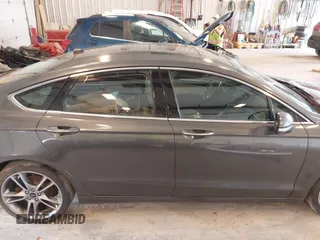 2016 Ford Fusion Titanium with VIN 3FA6P0D9XGR223354, listed as a IAAI auction lot 42621924 with Not provided miles and . Bid and sale history available at DreamBid. Image 13.