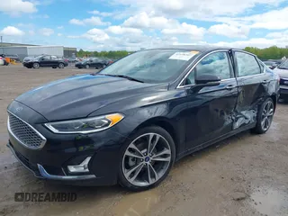 2019 Ford Fusion Titanium with VIN 3FA6P0K92KR248521, listed as a IAAI auction lot 42198307 with 51,844 mi miles and . Bid and sale history available at DreamBid. Image 2.