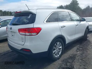 2018 Kia Sorento LX V6 with VIN 5XYPGDA52JG374276, listed as a IAAI auction lot 41825942 with 57,690 mi miles. Bid and sale history available at carsss.com. Image 4.