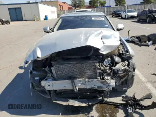 2019 Jaguar XE 25t with VIN SAJAR4FX6KCP49670, listed as a Copart auction lot 75340594 with 71,282 mi miles and Salvage Title. Bid and sale history available at carsss.com. Image 5.