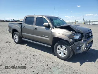 2014 Toyota Tacoma with VIN 3TMLU4EN7EM141763, listed as a Copart auction lot 59393505 with 50,177 mi miles and Salvage title. Bid and sale history available at DreamBid. Image 4.