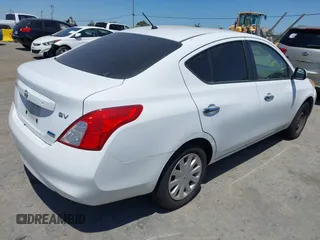 2012 Nissan Versa SV with VIN 3N1CN7AP5CL810401, listed as a IAAI auction lot 42592190 with 197,815 mi miles and . Bid and sale history available at DreamBid. Image 4.