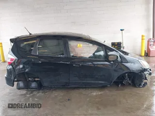 2013 Honda Fit Sport with VIN JHMGE8H57DC033384, listed as a IAAI auction lot 41871356 with 150,777 mi miles. Bid and sale history available at carsss.com. Image 12.