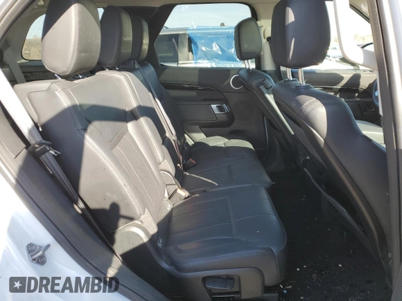 2018 Land Rover Discovery with VIN SALRG2RK3JA050768, listed as a Copart auction lot 68777012 with 104,776 mi miles and . Bid and sale history available at DreamBid. Image 11.