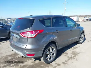2013 Ford Escape SEL with VIN 1FMCU9H93DUA72572, listed as a IAAI auction lot 41633096 with 190,816 mi miles. Bid and sale history available at carsss.com. Image 4.